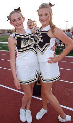 Image: Kirby Nelson and Annie Perry get photobmbed by fellow cheerleaders Karley Nelson and Karson Holley.