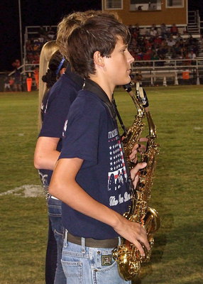 Image: Ty Hamilton and the Gladiator Regiment Marching Band entertain fans during halftime.
