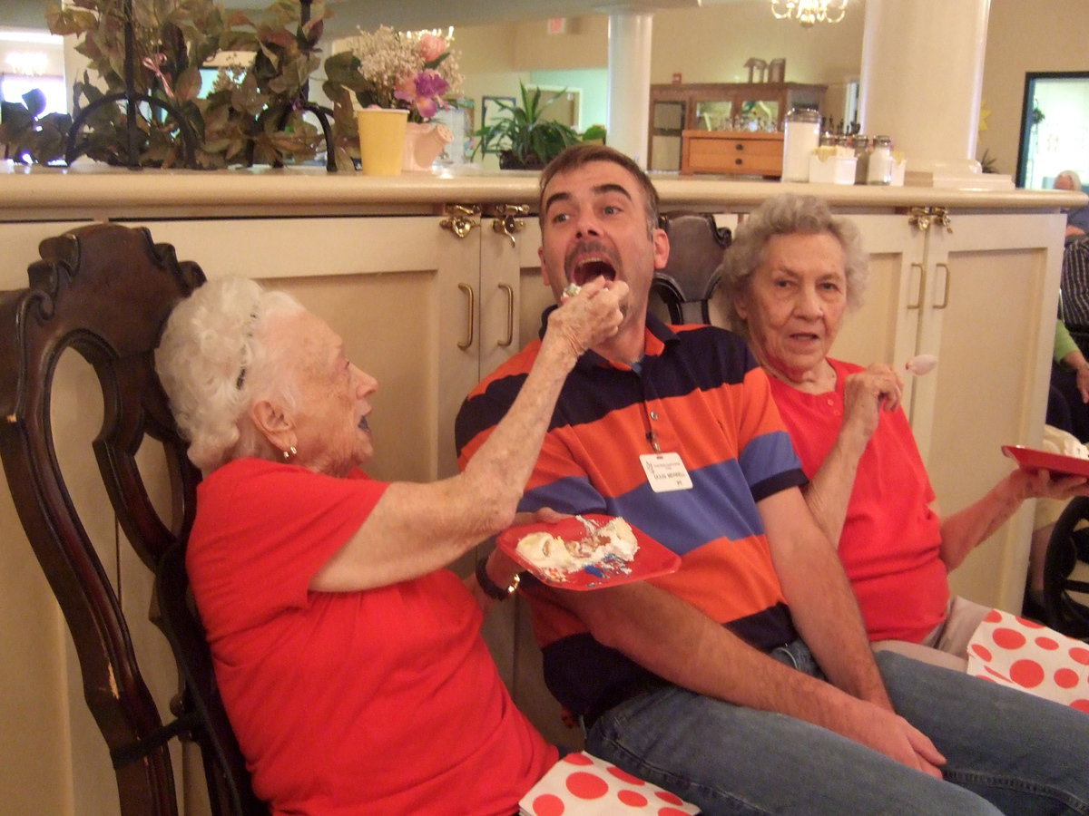 Image: Gwen Somerville shares her cake with Doug.