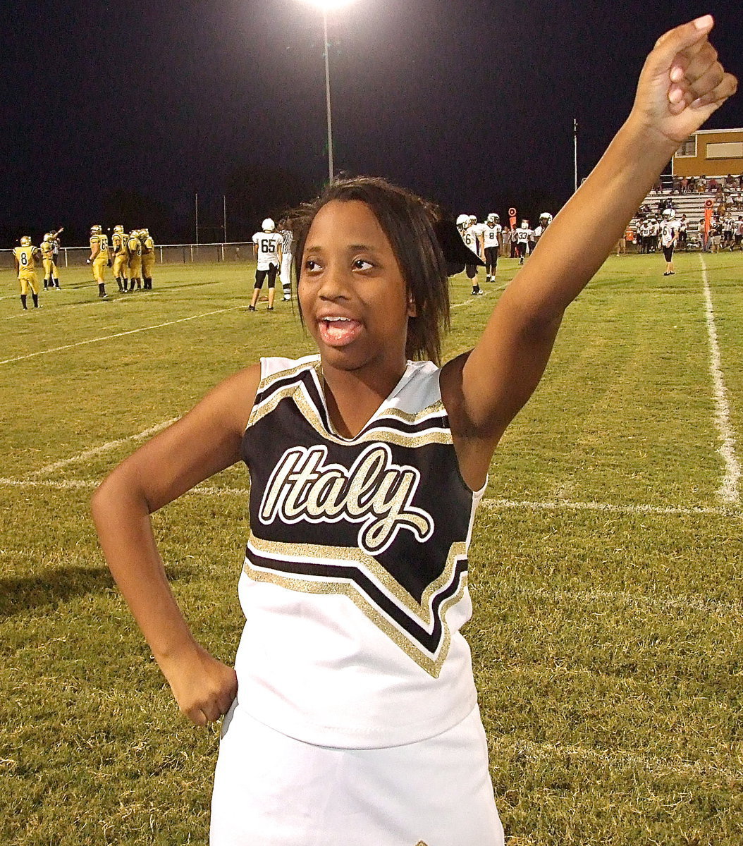 Image: Cheerleader Keondra Jackson keeps the spirit going despite a tough night for Italy’s JV Gladiators.