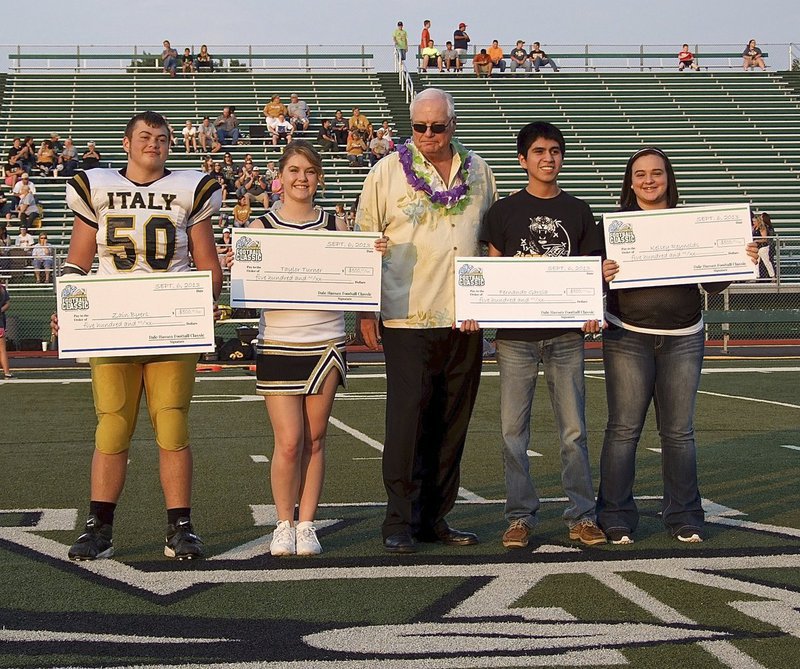 Image: Italy’s Zain Byers and Taylor Turner represent Italy High school as the 2013 Dale Hansen Football scholarship winners as they pose with Dale Hansen and Malakoff’s student winners during a pre-game ceremony before Friday’s game between Italy and Malakoff at Stuart B. Lumpkins Stadium in Waxahachie. A senior boy and girl from each participating school is awarded a $500 scholarship.