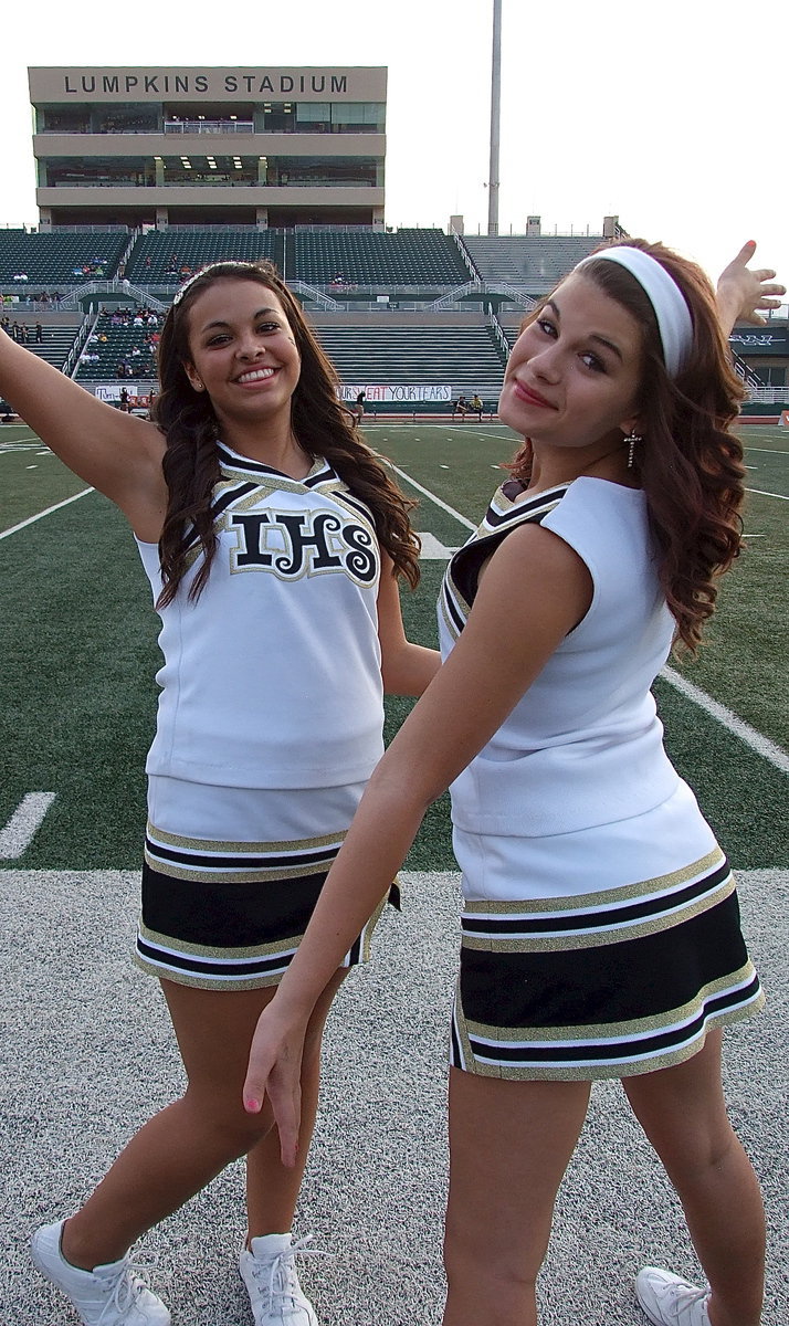 Image: Italy HS cheerleaders Ashlyn Jacinto and Kristian Weeks take in the atmosphere that only the Dale Hansen Football Classic can provide.