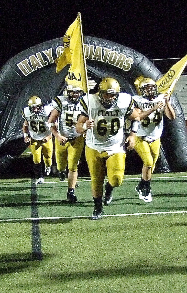 Image: Kevin Roldan(60), Bailey Walton(54), Zain Byers(50) and Kyle Fortenberry(66) lead the Gladiators into the second half of play.