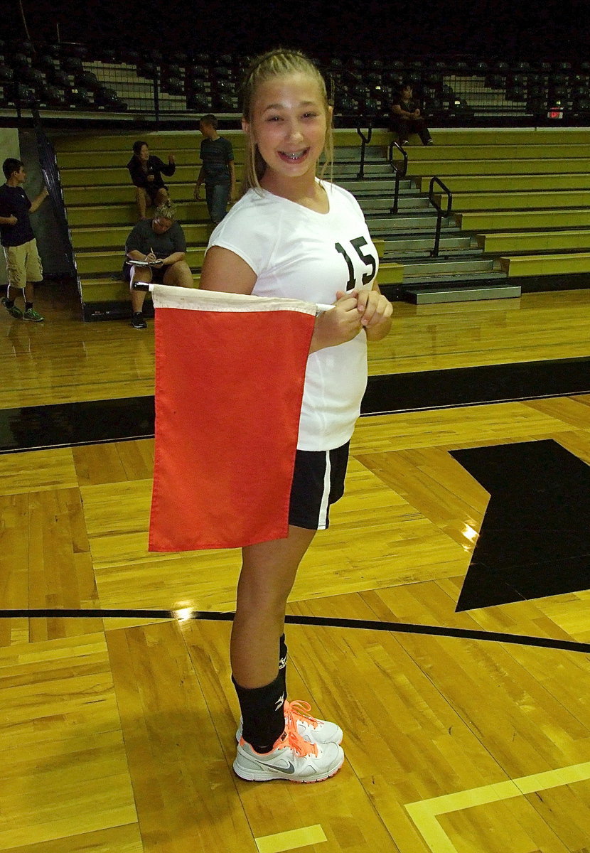 Image: Maegan Connor(15) serves as a line judge in her spare time.