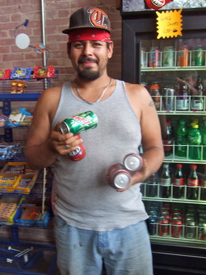 Image: Customer A. J. Jacinto is loading up with all kinds of soda.