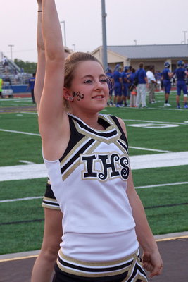 Image: Italy HS cheerleader Britney Chambers helps get Gladiator fans ready for the game.