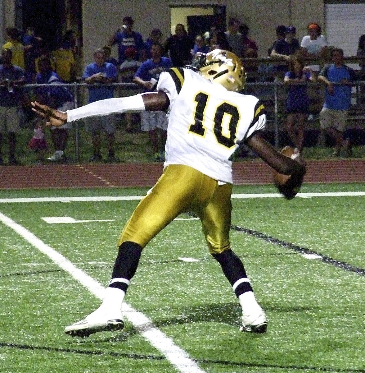 Image: TaMarcus Sheppard(11) launches a bomb pass downfield.