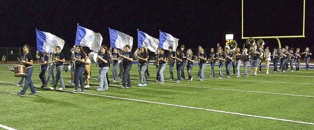 Image: Italy’s band of soldiers dramatically marches onto the field of battle.