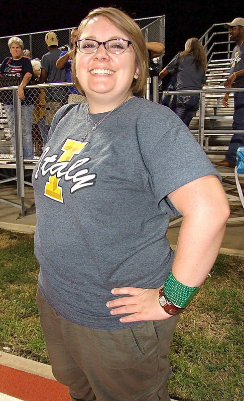 Image: Catherine Hewett displays her superhero like qualities when it comes to overseeing the varsity cheerleaders.