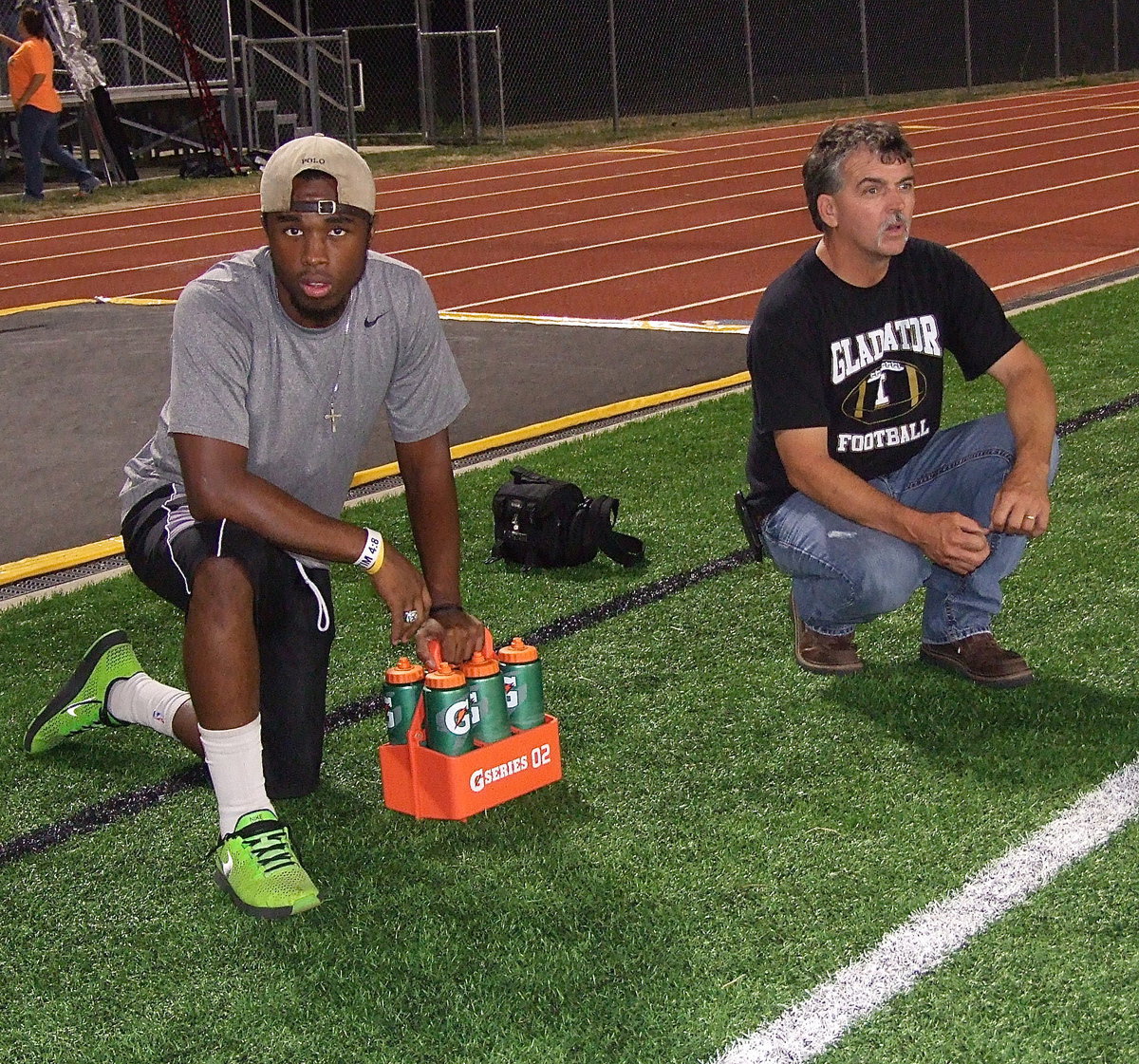 Image: The Tunnel Crew: Jasenio Anderson and Gary Wood study the game.