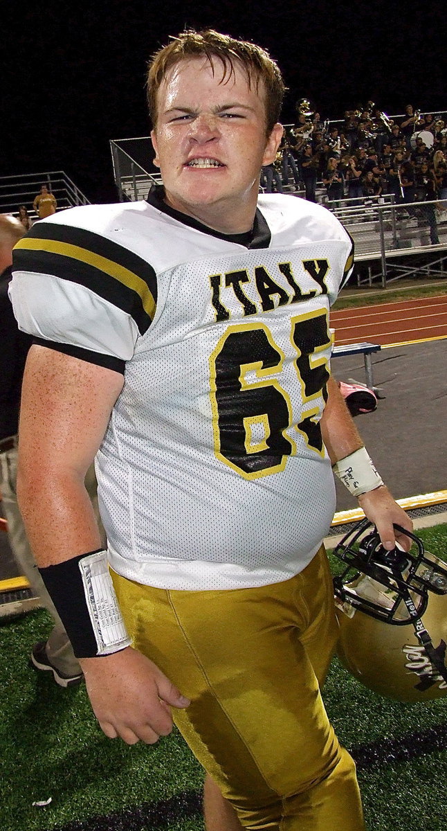 Image: Tyler Vencill(65) is game faced up for the second half.