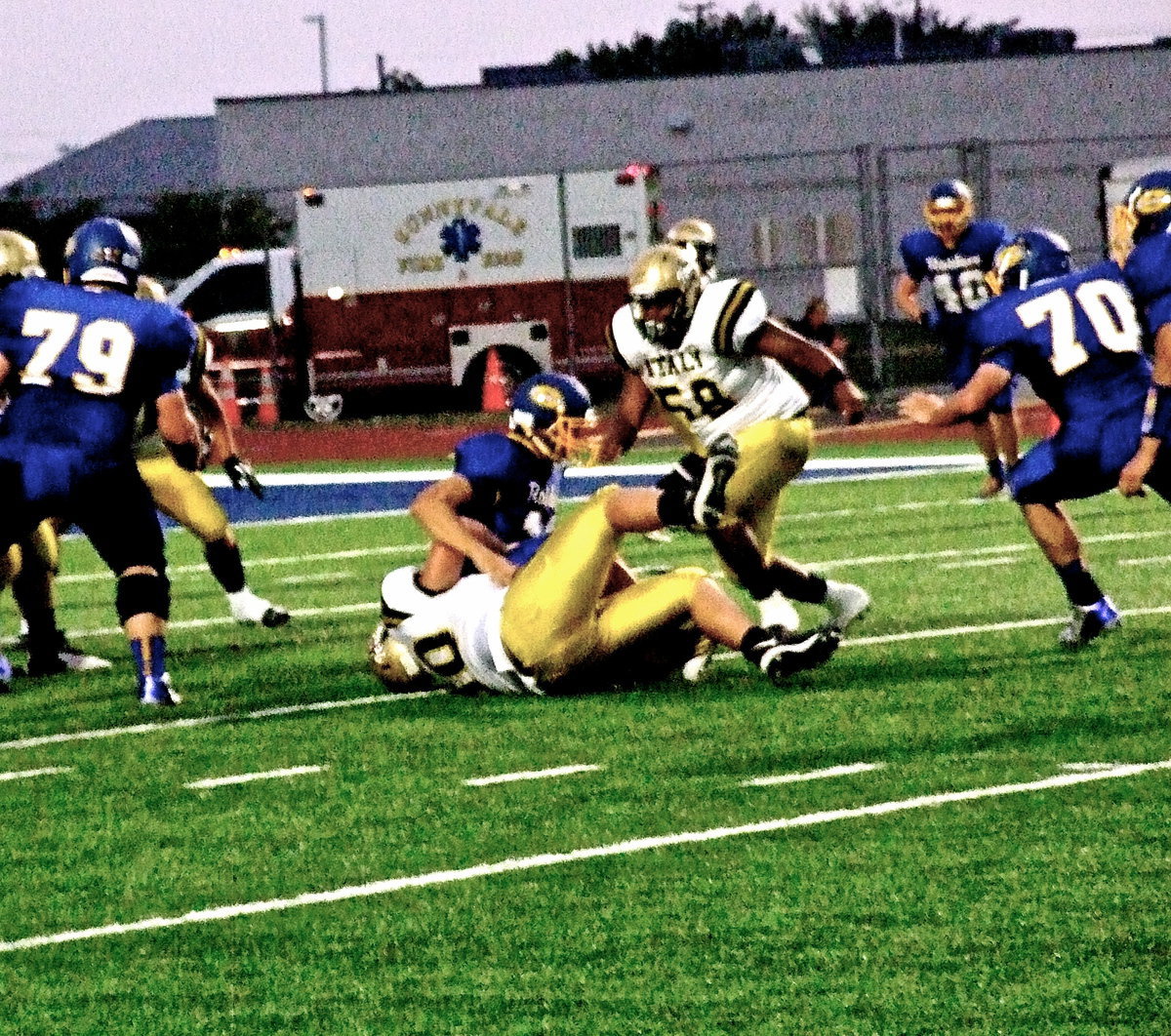 Image: Senior defensive end Zain Byers(50) records a sack against Sunnyvale.