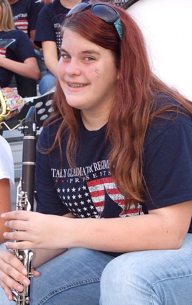 Image: Christy Murray with her clarinet and a smile.