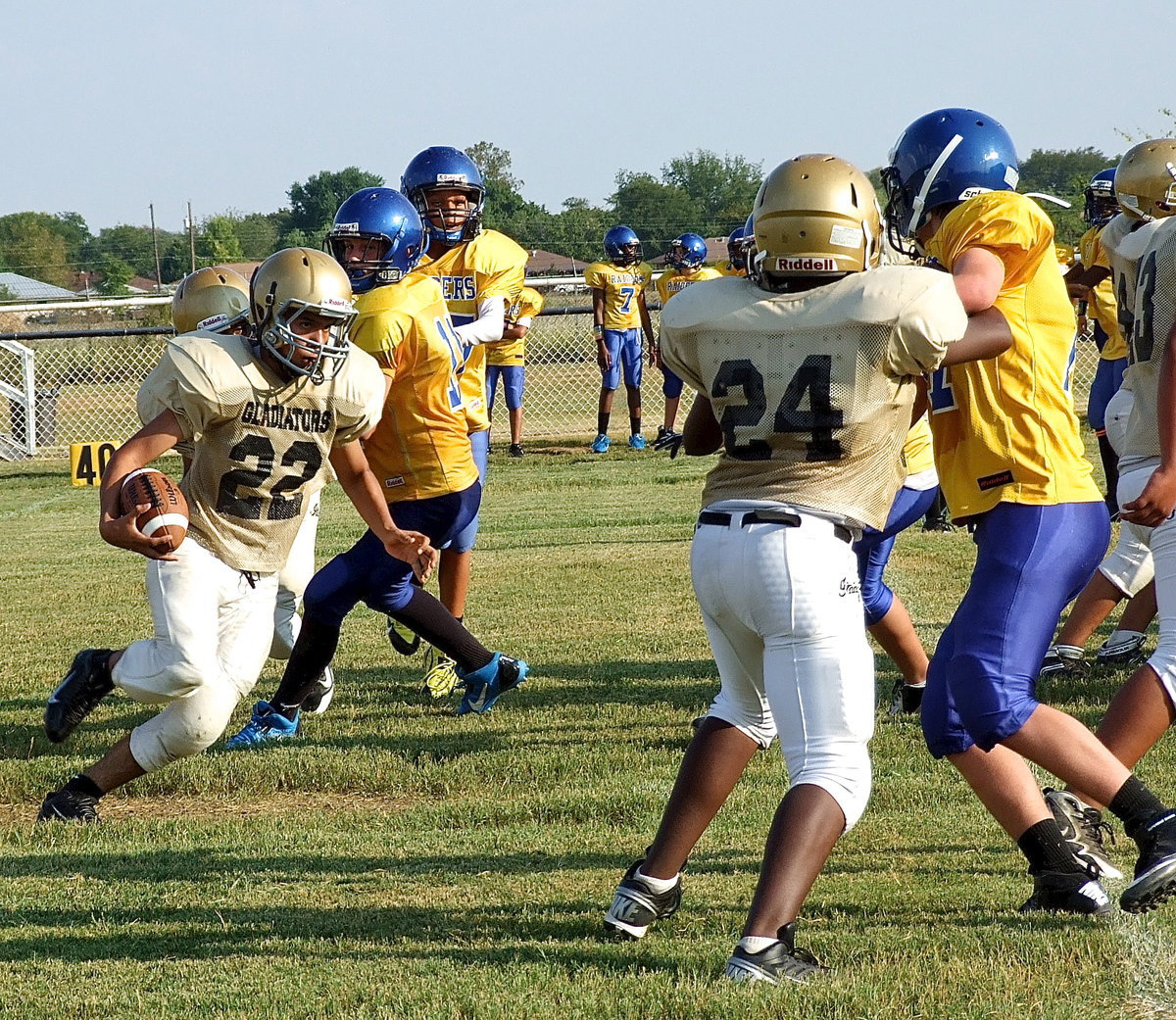 Image: Jonathan Salas(22) turns upfield for positive yards.