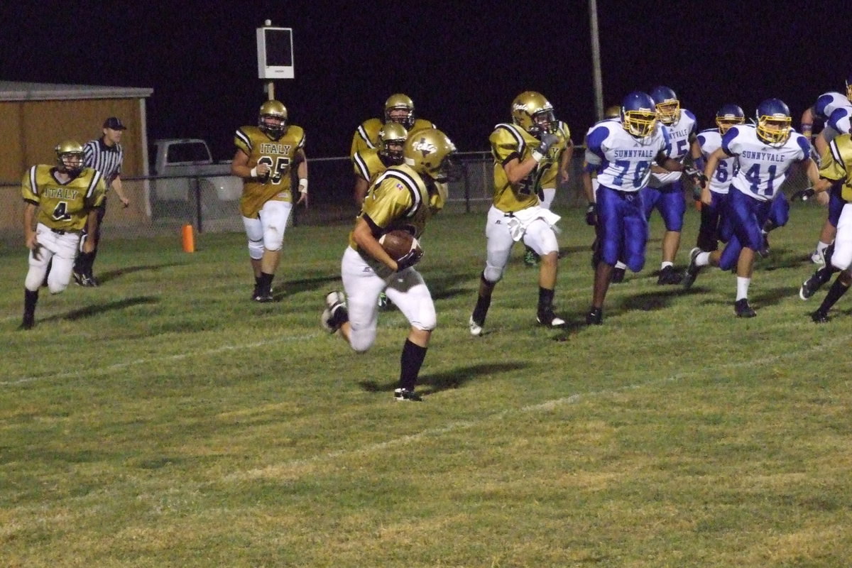 Image: Italy’s Kyle Machovich(88) intercepts a Raider pass to rob Sunnyvale of a sure touchdown.