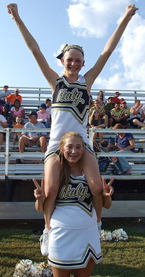 Image: Italy JH cheerleaders Taylor Turner and Maegan Connor combine to make some school spirit!