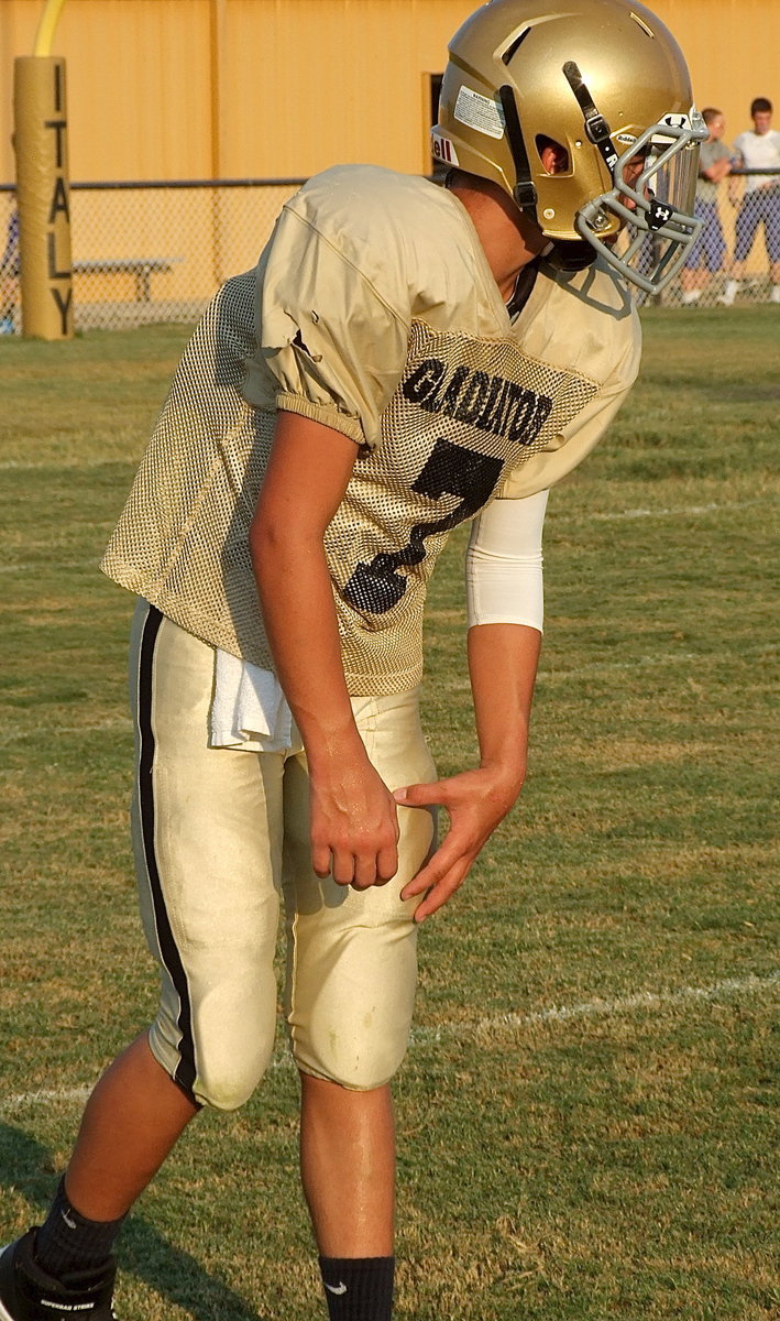 Image: 8th grade receiver Gary Escamilla(7) awaits the snap.