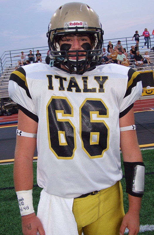 Image: Kyle Fortenberry(66) is all decked out for an evening of Gladiator football.