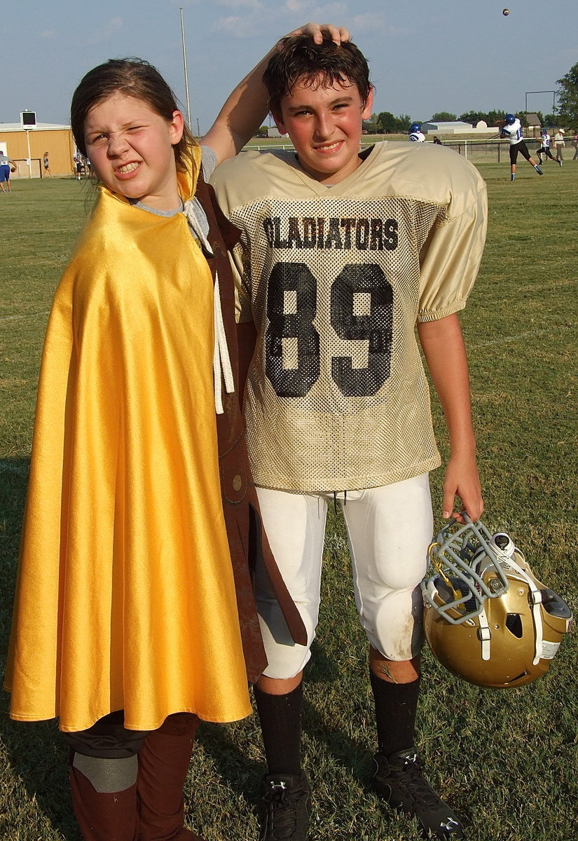 Image: Italy Junior High Mascot, Tatum Adams, congratulates her best friend in the whole world, Andrew Oldfield(89) after his hard fought game.