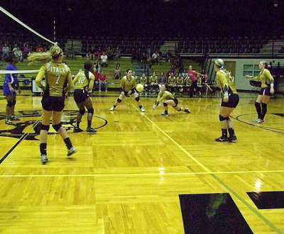 Image: Bailey Eubank(1) gets the dig for the Lady Gladiators.