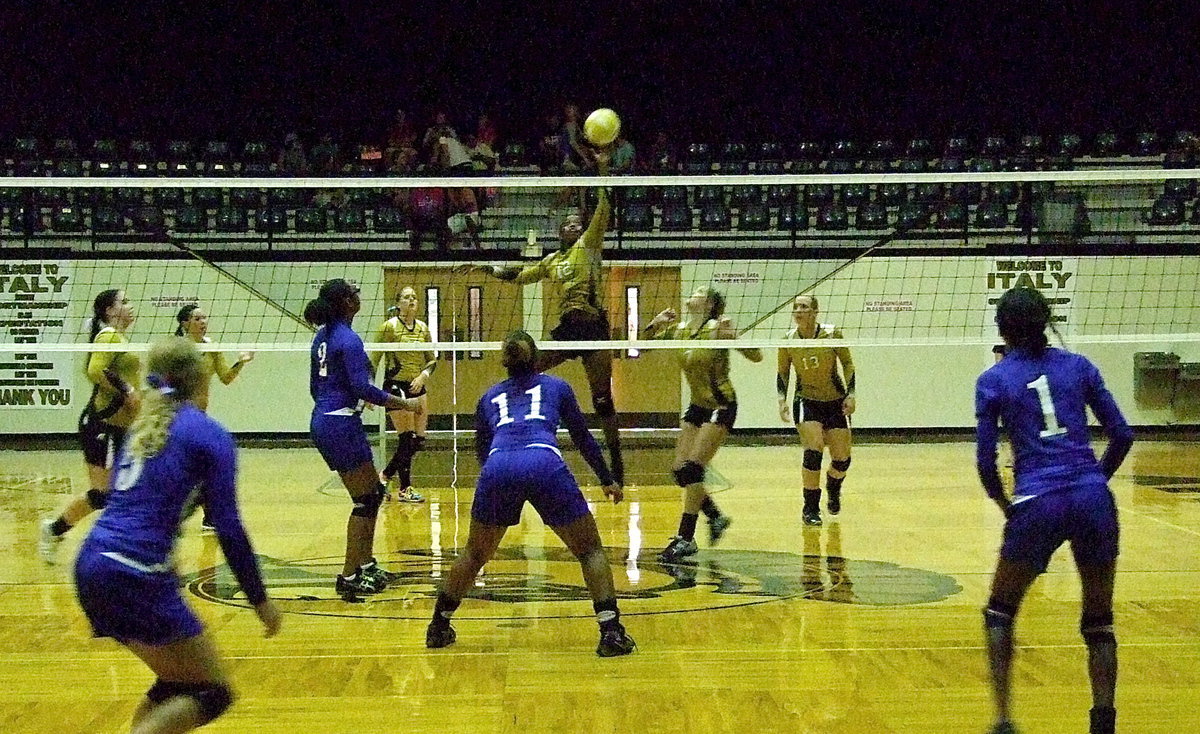 Image: Kortnei Johnson(12) keeps Milford’s defense guessing.