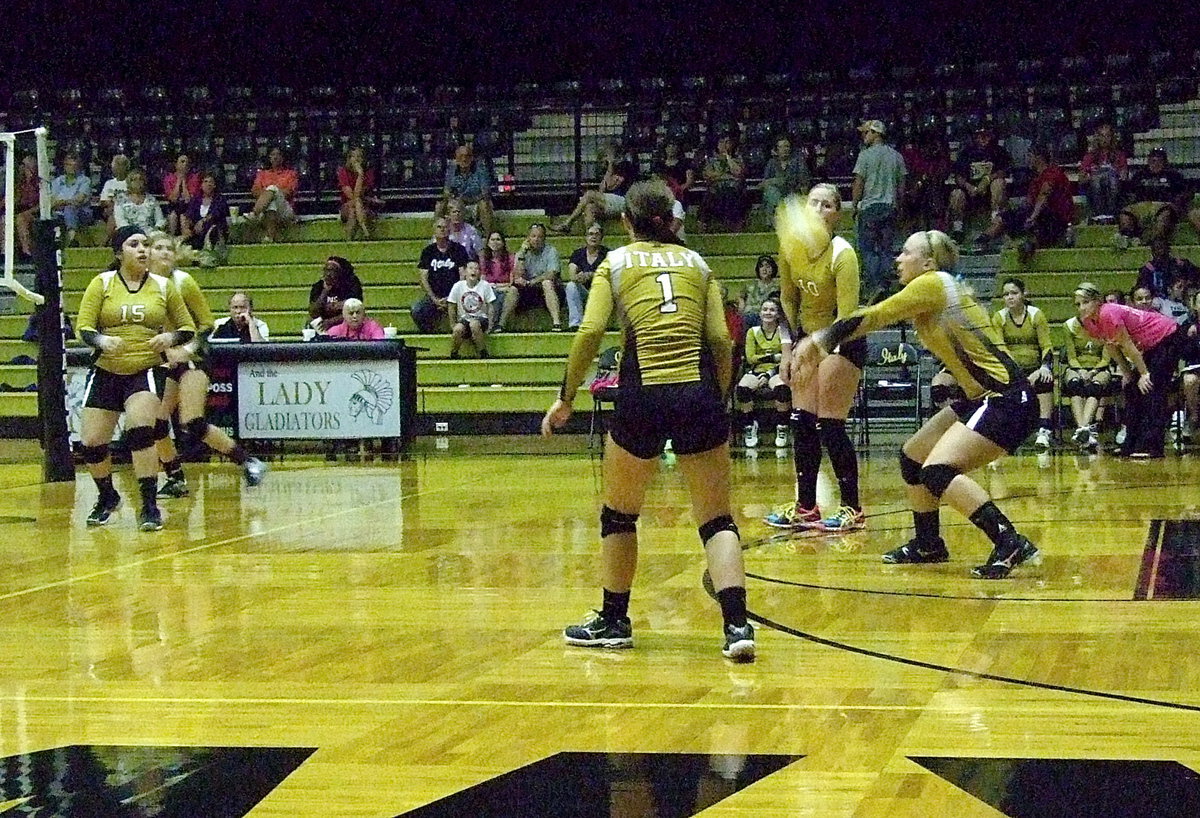 Image: Jaclynn Lewis(13) responds to a MIlford serve as the Lady Gladiators respond with a sweeping victory over Milford after Italy lost the first two meetings of the season against the Lady Bulldogs.