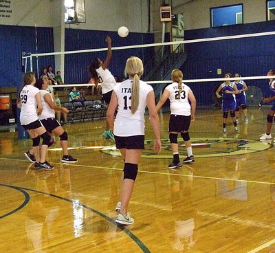 Image: Italy 8th grader Emmy Cunningham(27) goes for the spike.