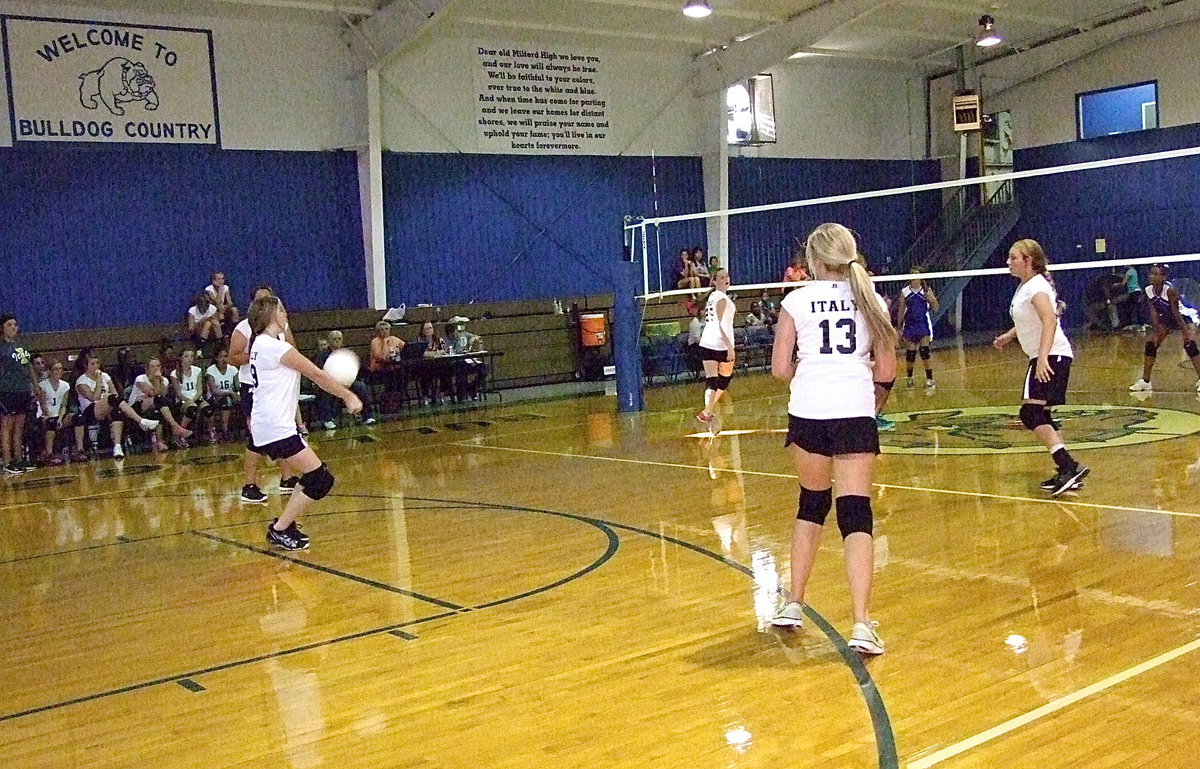 Image: Italy 8th grader Grace Haight(29) bumps the ball to her teammates.