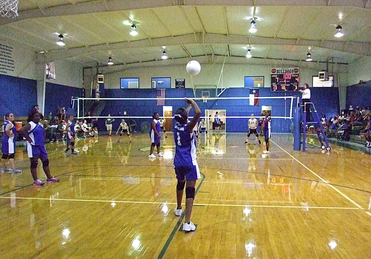 Image: Milford’s Jace McIntyre(1) serves to Italy.