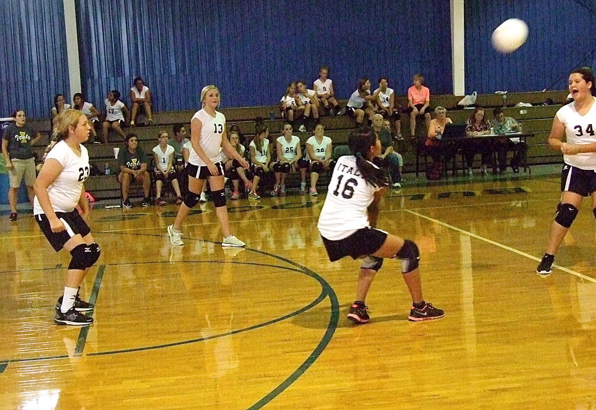 Image: Incoming! Marlen Hernandes(16) reacts to a Milford serve.