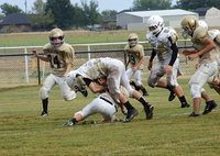 Image: The Junior High Gladiators upend Hubbard on the final play of the game to win at home 12-6 over the visiting Jaguars.