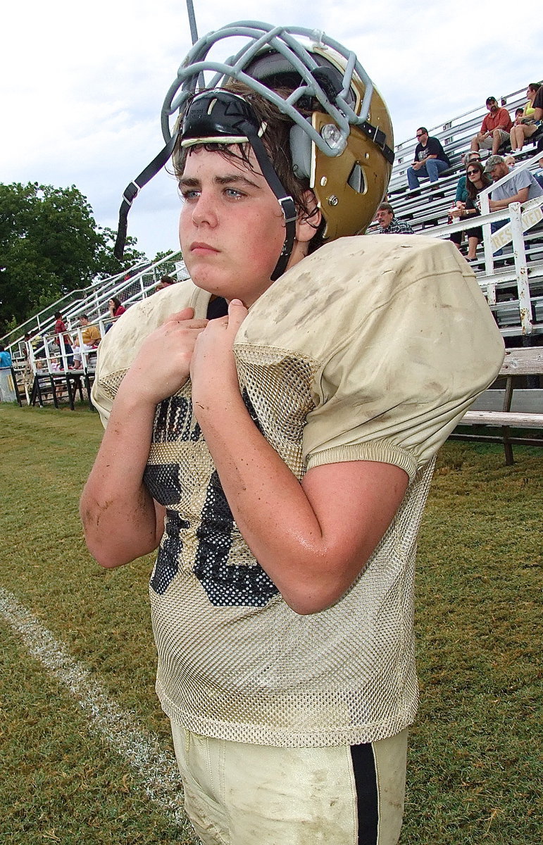 Image: Cade Roberts(50) peers across the field at the Jaguar sideline.