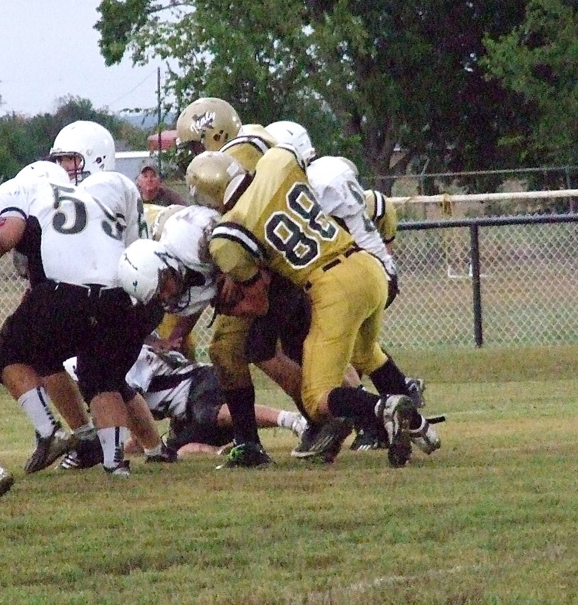 Image: Kyle Machovich(88) swoops in again for another tackle against Hubbard(88).