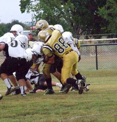 Image: Kyle Machovich(88) swoops in again for another tackle against Hubbard(88).