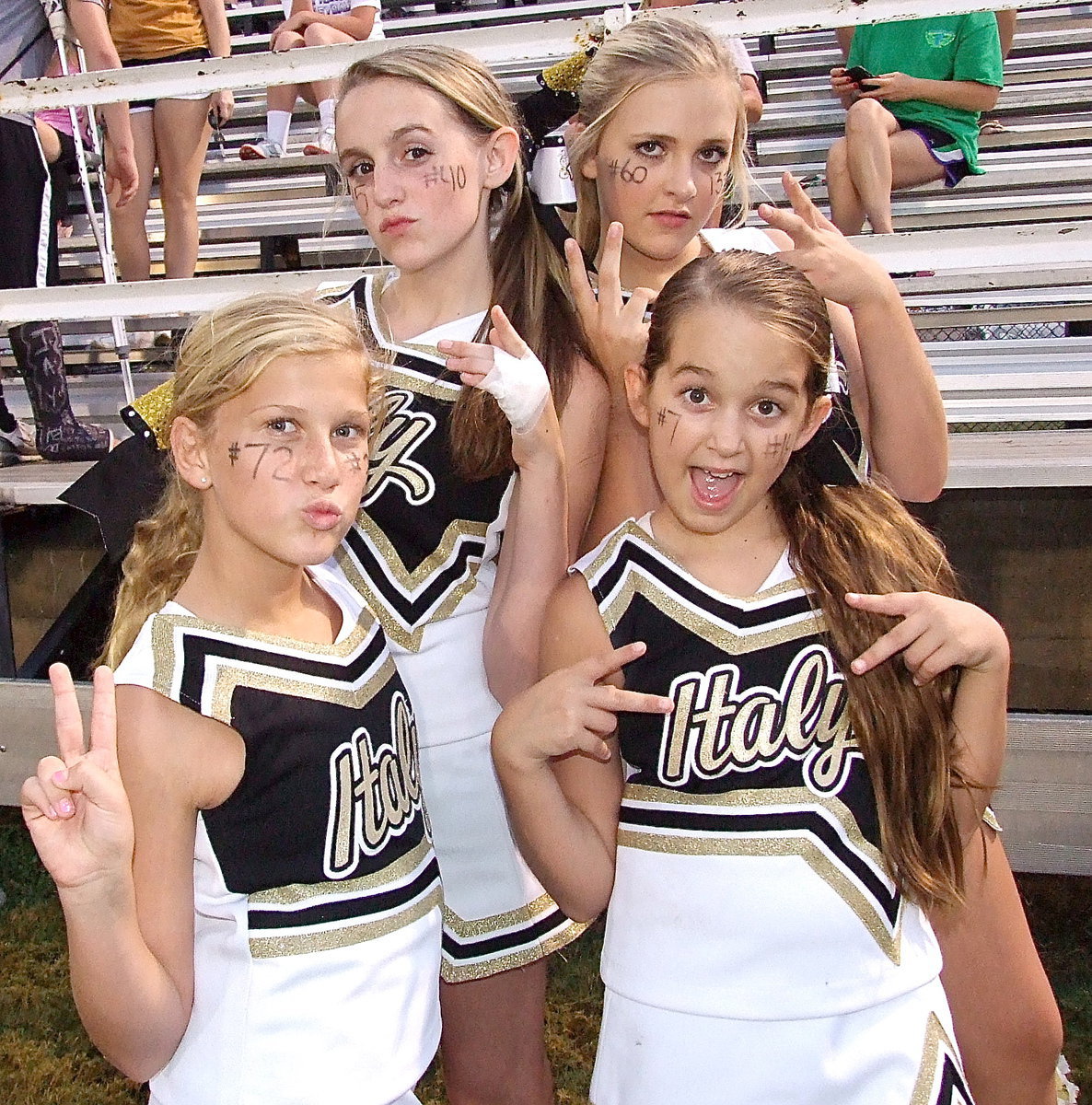 Image: Kirby Nelson, Annie Perry, Karson Holley and Karley Nelson celebrate Italy’s junior high win over Hubbard.