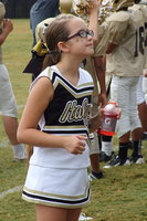 Image: Italy JH cheerleader Karley Nelson settles in for the junior high game.