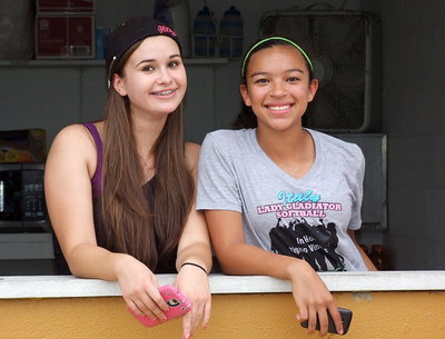Image: Italy HS students Amber Hooker and April Lusk help with the concessions.