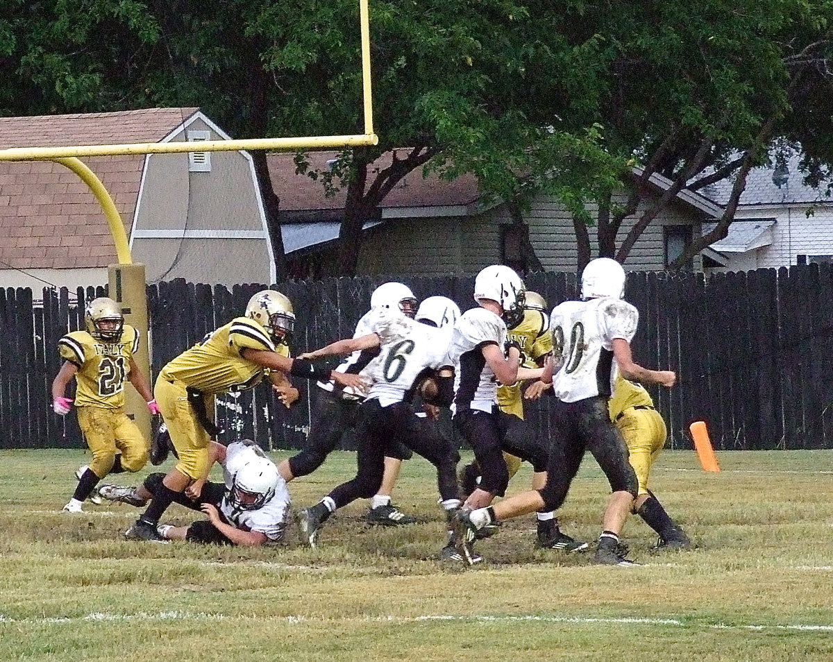 Image: Despite the efforts by end David De La Hoya(60), Hubbard scampers in for the go ahead touchdown.