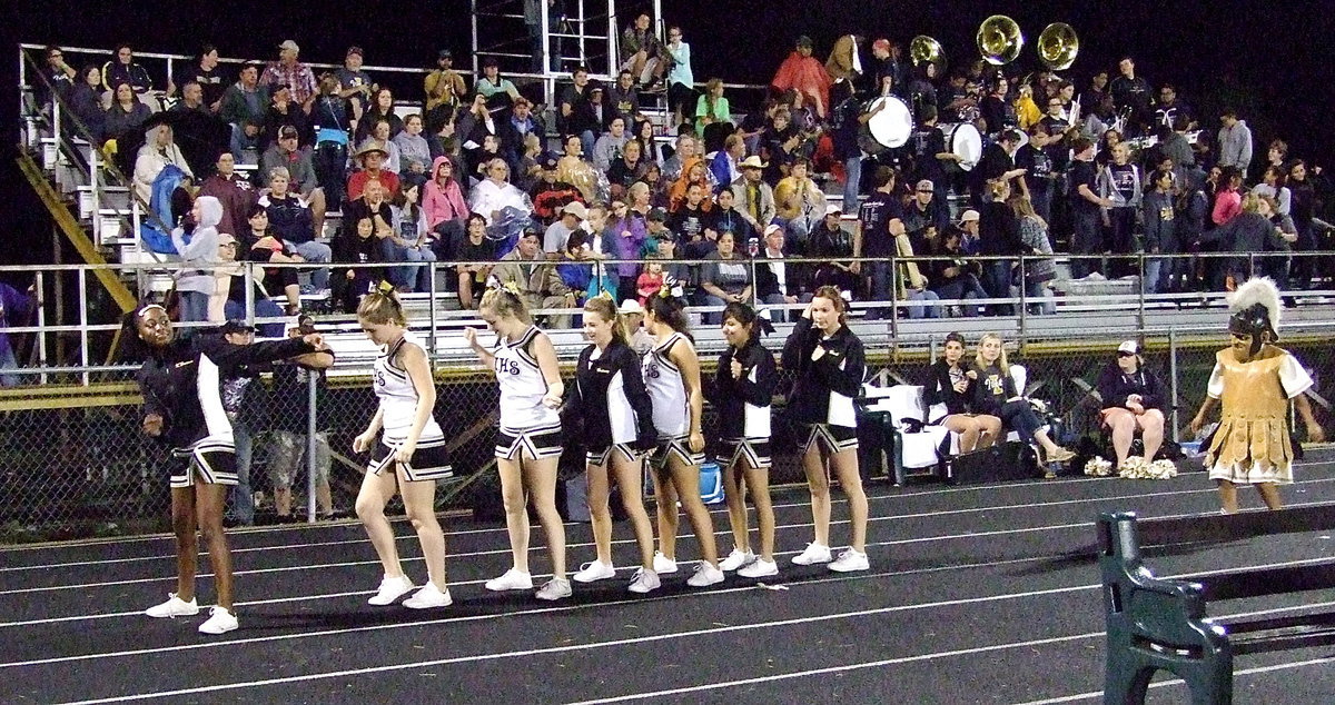 Image: The Italy High School cheerleaders make rain.