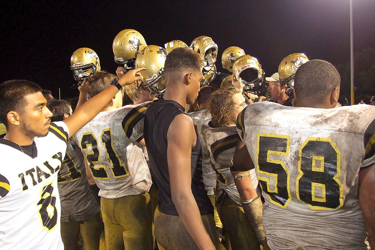 Image: Ray Salas(6), Trevon Robertson, Darol Mayberry(58) and the rest of their Gladiator teammates remain committed to their goals.