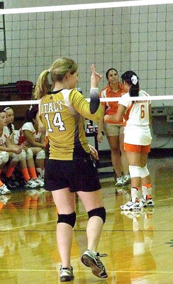 Image: Taylor Turner(14) acknowledges her fan base after scoring a point for the Lady Gladiators.