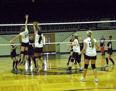 Image: Grace Haight(29) and Jenna Holden(34) make a wall at the net.