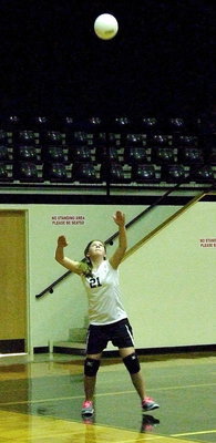 Image: Tatum Adams(21) doesn’t serve the ball, she force-feeds it.
