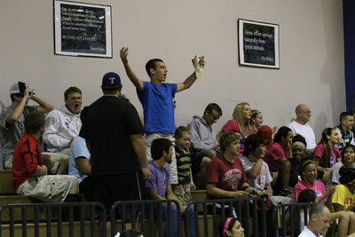 Image: Gladiator Nation: Italy’s Ryan Connor leads the cheers after the Lady Gladiators fight back to tie the 3rd set 24-24.