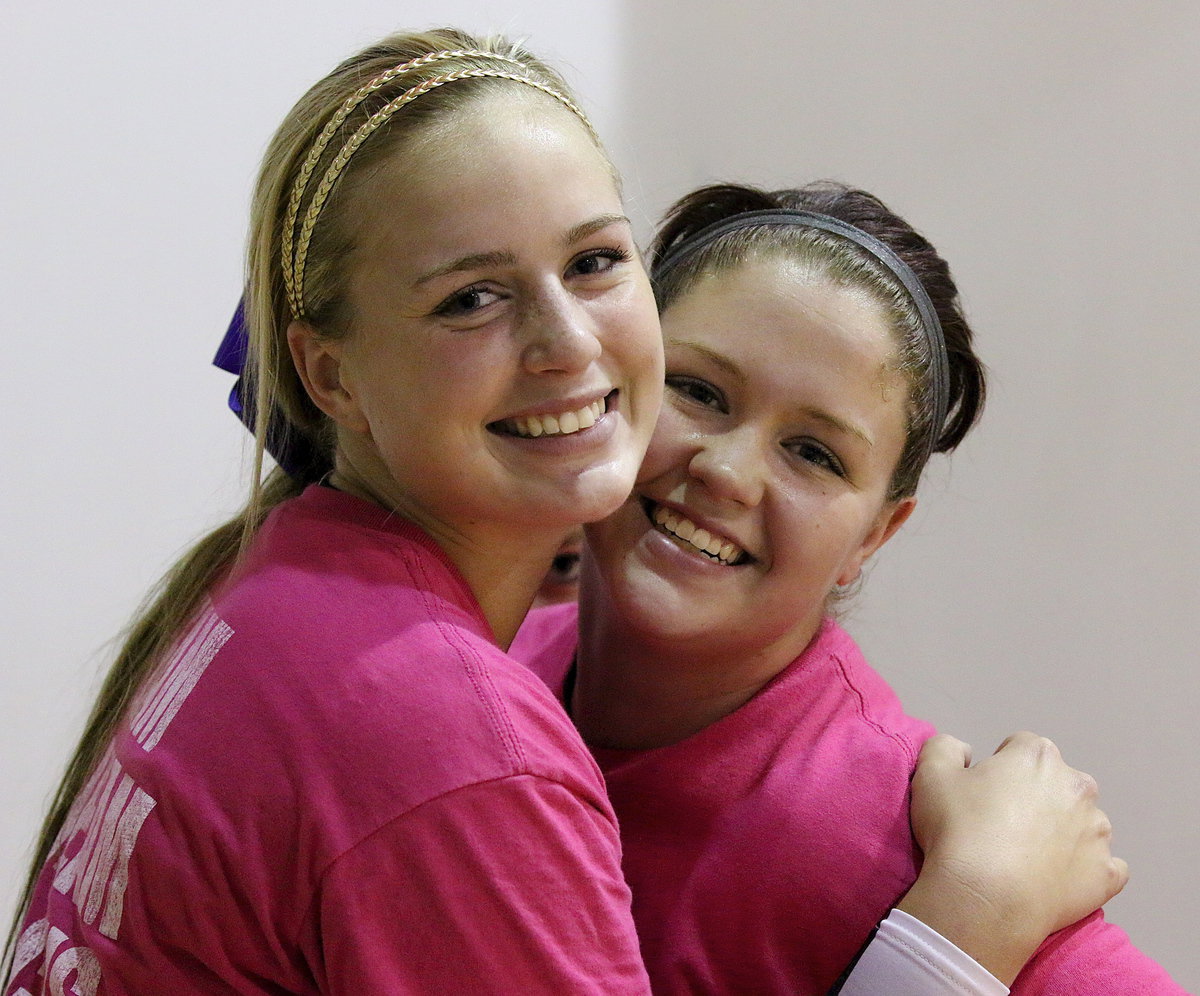 Image: Madison Washington and Paige Westbrook during pre-game warmups.