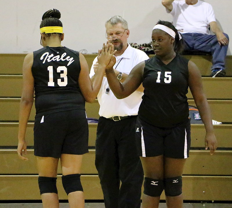 Image: JV Lady Gladiator Taleyia WIlson(15) checks in for Oleshia Anderson(13).