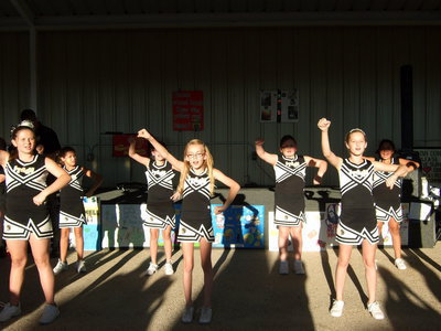 Image: IYAA cheerleaders keeps the crown entertained.