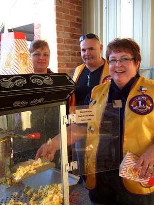 Image: The Lions Club was busy handing out popcorn.