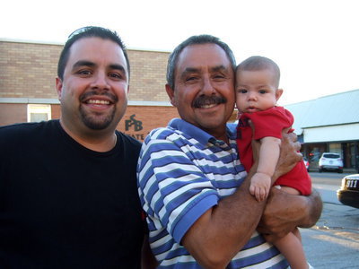 Image: Diego Garcia and Albert Garcia, Sr. posing with his grandson.