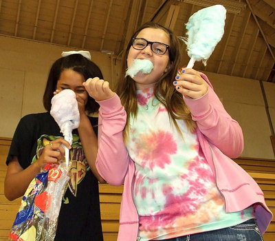 Image: Alex Minton and Reagan Adams are not shy when it comes to eating cotton candy.